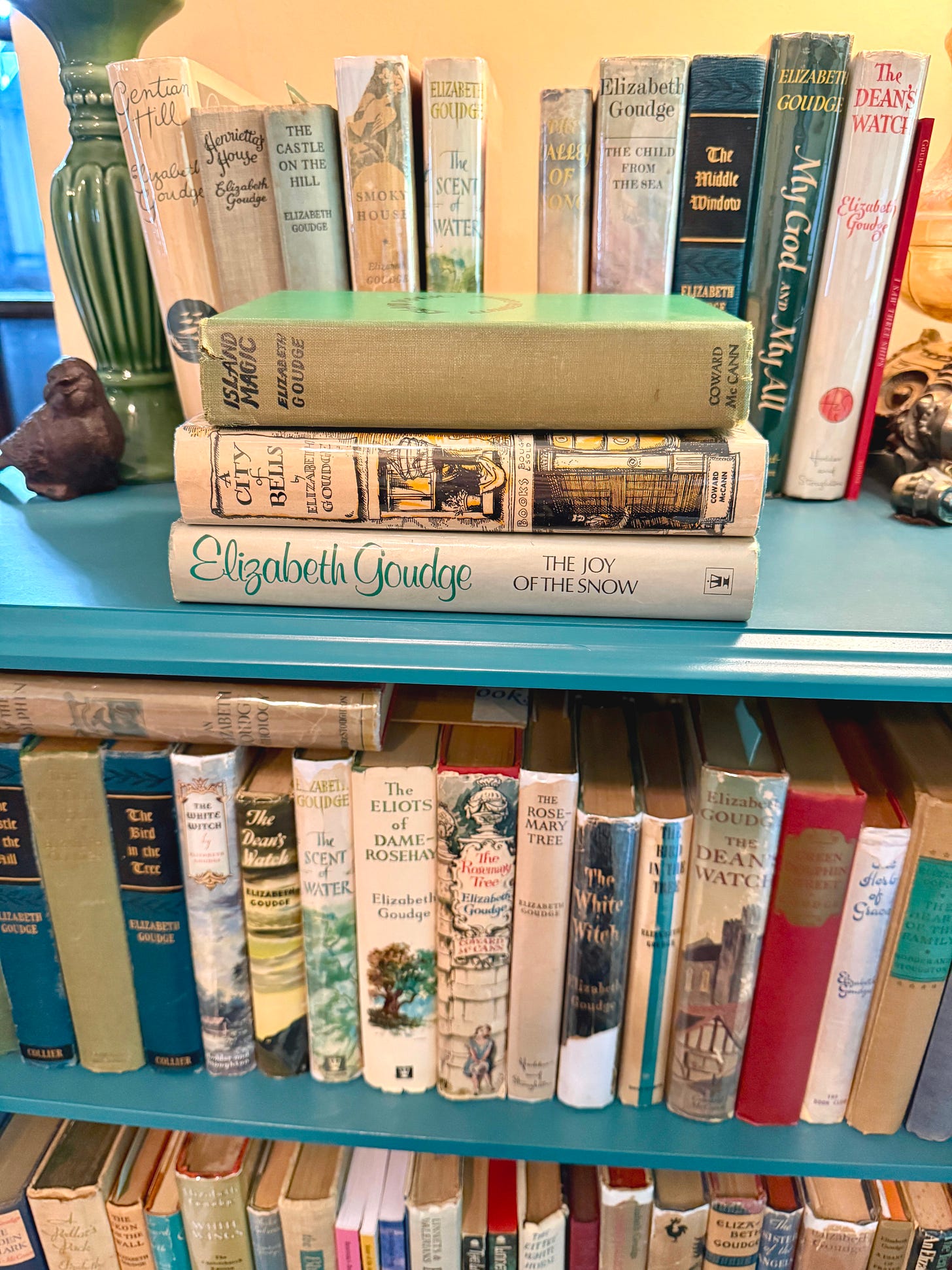 The Joy of the Snow by Elizabeth Goudge with her novels, A City of Bells, Island Magic, and the rest of my Goudge bookcase this week. The Joy of the Snow by Elizabeth Goudge with her novels, A City of Bells, Island Magic, and the rest of my Goudge bookcase this week.