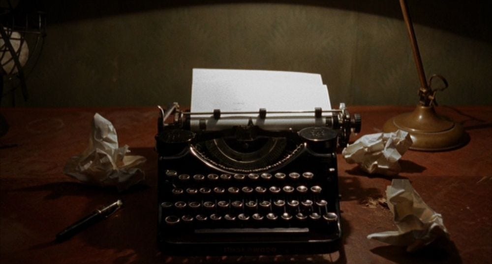 Barton Fink's typewriter, surrounded by crumpled pieces of paper