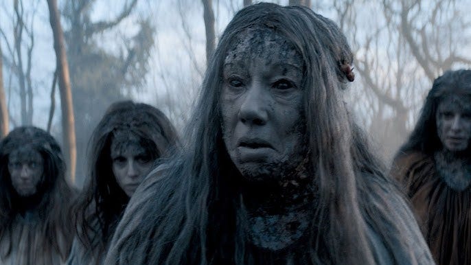 This image shows the mud-covered, reanimated Morax corpses of Mother Twiston (played by Tricia Kelly, center) and three other Bilehurst Cragg women executed for practicing witchcraft in "The Witchfinders" (Doctor Who Series 11's eighth episode). This image shows the mud-covered, reanimated Morax corpses of Mother Twiston (played by Tricia Kelly, center) and three other Bilehurst Cragg women executed for practicing witchcraft in "The Witchfinders" (Doctor Who Series 11's eighth episode).