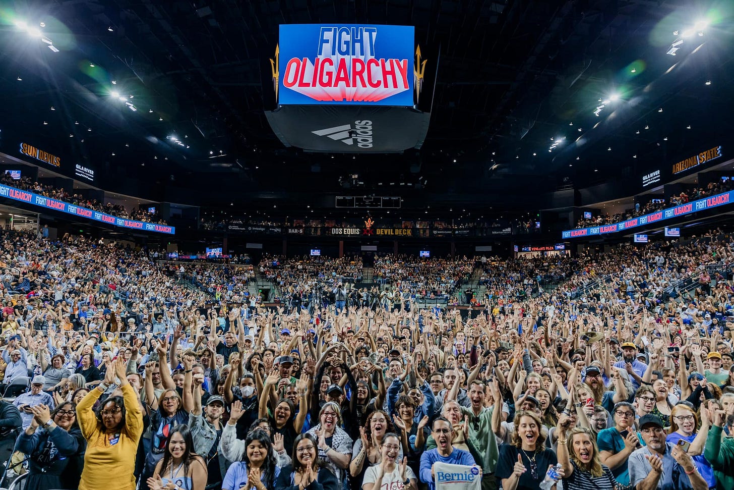 May be an image of basketball, crowd and text