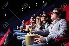 Young People Watch Movies In Cinema Stock Photo, Picture and Royalty Free  Image. Image 9499807.