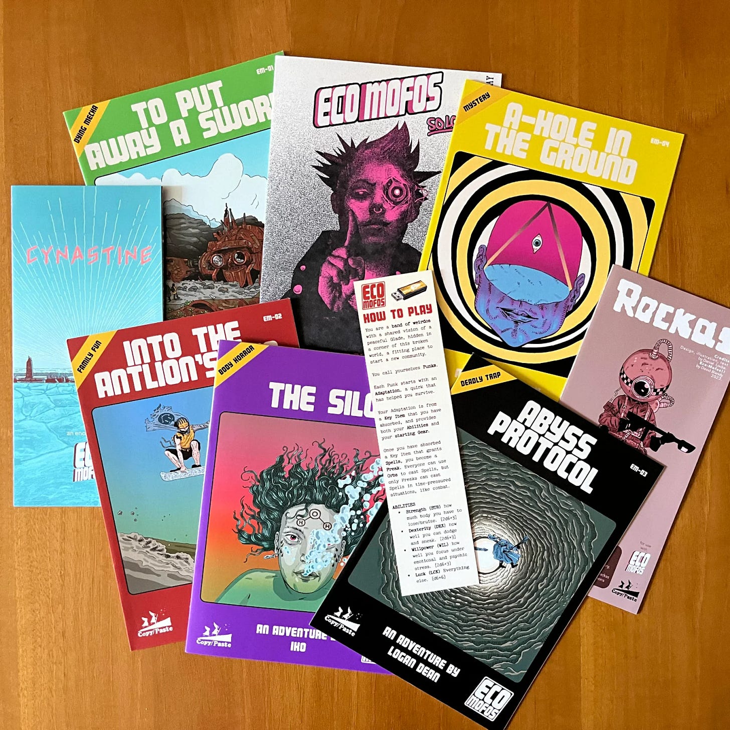 EcoMOFOS adventure bundle featuring zines, pamphlets, bookmark