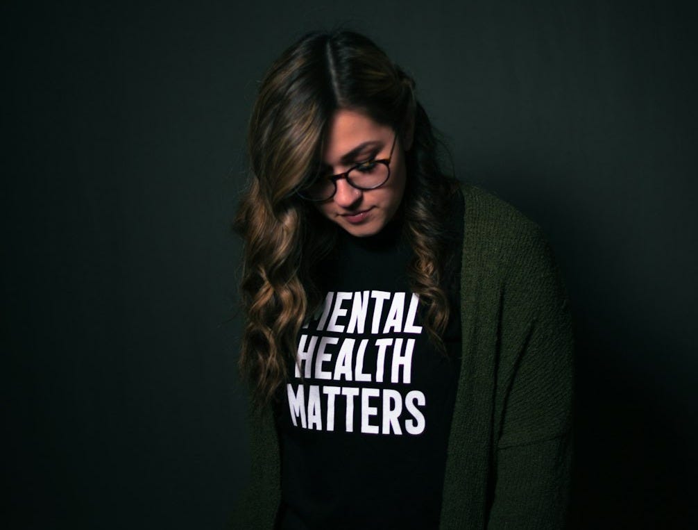 woman in black and white long sleeve shirt