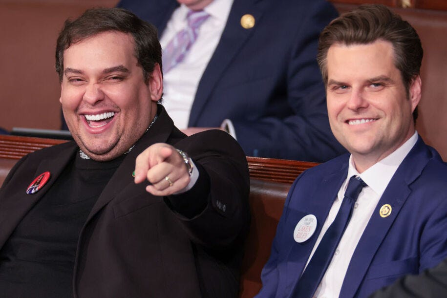 WASHINGTON, DC - MARCH 07: Former U.S. Rep. George Santos (R-NY) (L) sits with Rep. Matt Gaetz (R-FL) at U.S. President Joe Biden's State of the Union address during a joint meeting of Congress in the House chamber at the U.S. Capitol on March 07, 2024 in Washington, DC. This is Bidenâ€™s last State of the Union address before the general election this coming November. (Photo by Win McNamee/Getty Images)