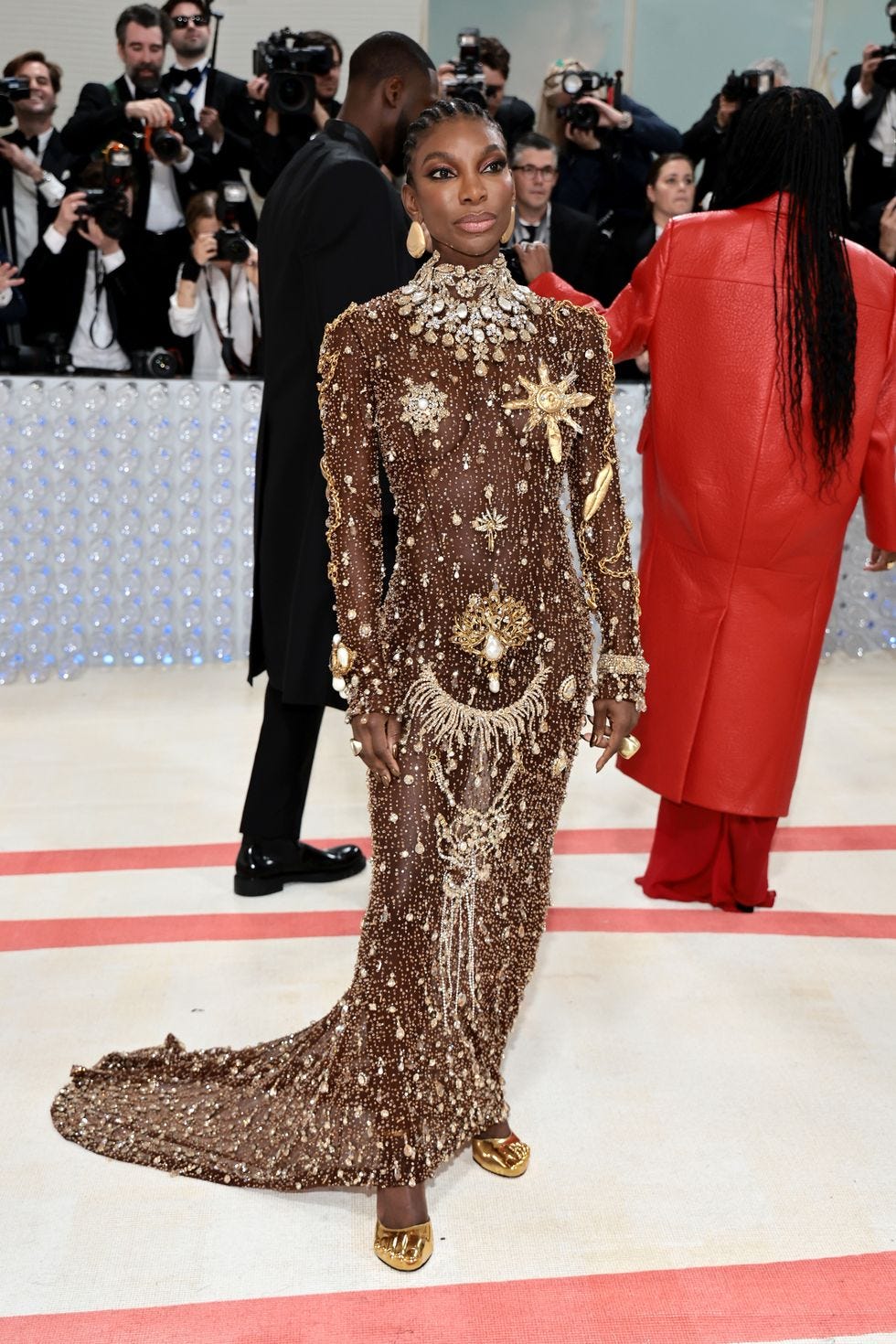 Michaela Coel Wears Jewel-Adorned Golden Gown to 2023 Met Gala