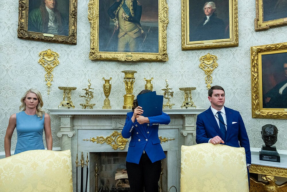 A thousand words? This exclusive New York Times photo from Saturday carried this caption: “Gov. Gretchen Whitmer of Michigan found herself in the Oval Office this week not for a one-on-one meeting with President Trump, but an appearance before the press corps. She temporarily shielded herself from the cameras.”