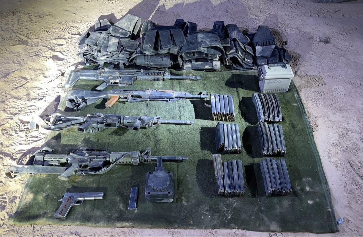 Mexican law enforcement officers confiscated a small arsenal inside a suspected human smuggling stash house across the border from Ajo, AZ. Mexican law enforcement officers confiscated a small arsenal inside a suspected human smuggling stash house across the border from Ajo, AZ.
