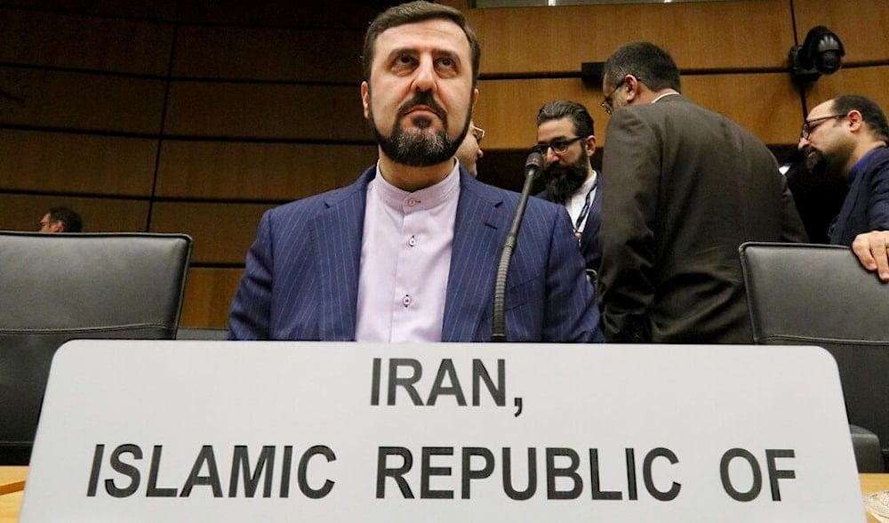 In this Thursday, Nov. 21, 2019 file photo Iran's Ambassador to the IAEA, Kazem Gharibabadi, waits for the start of the IAEA board of governors meeting at the International Center in Vienna, Austria. (AP) In this Thursday, Nov. 21, 2019 file photo Iran's Ambassador to the IAEA, Kazem Gharibabadi, waits for the start of the IAEA board of governors meeting at the International Center in Vienna, Austria. (AP)