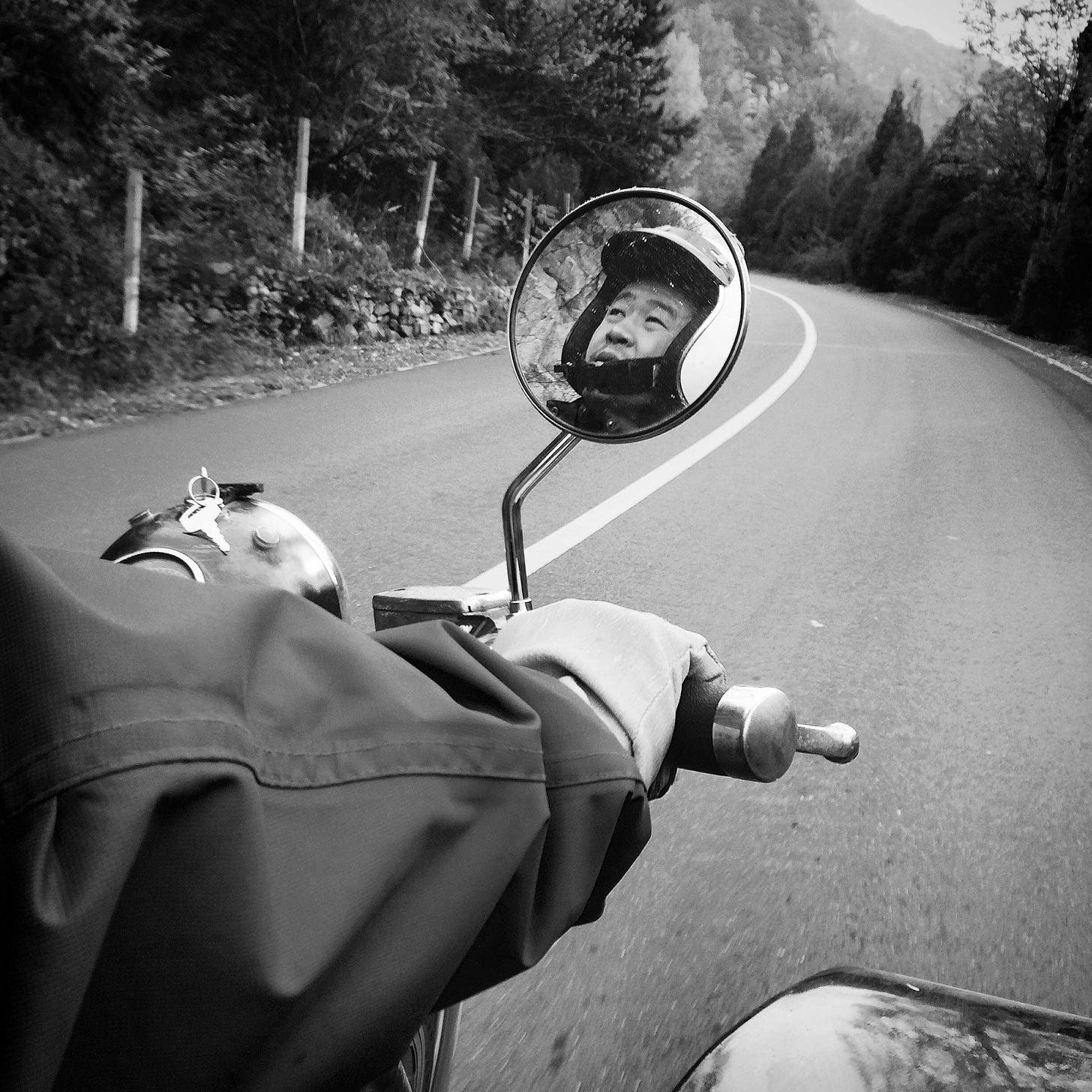 Sidecar driver on a road in Huairou District, northern Beijing.