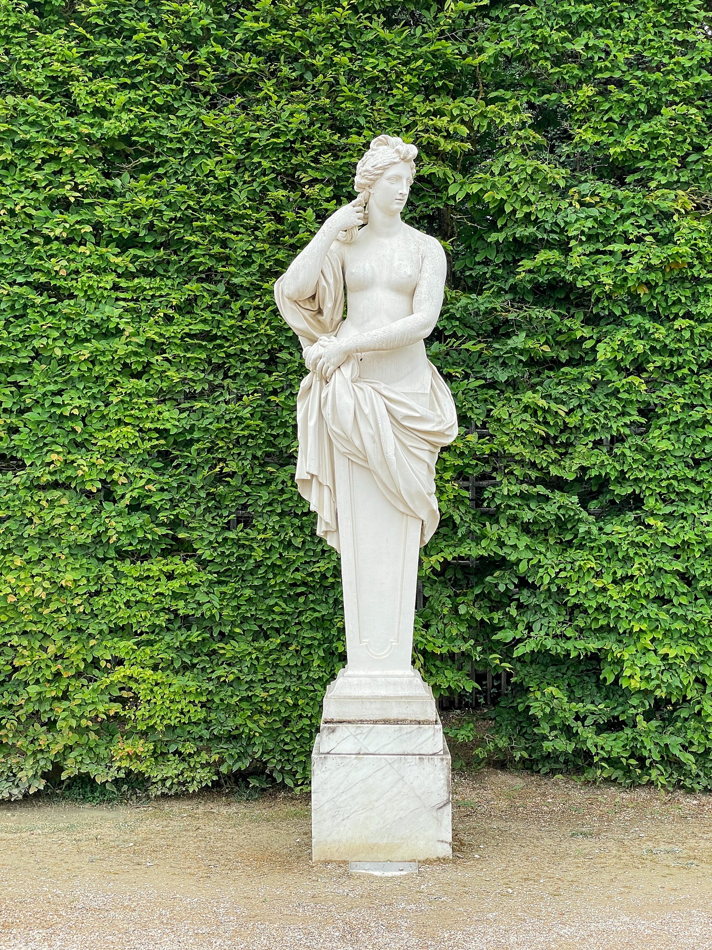 A statue at the garden of Versailles