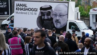 Van with a protest poster highlights Saudi human rights violations, including the 2018 killing of journalist Jamal Khashoggi.
