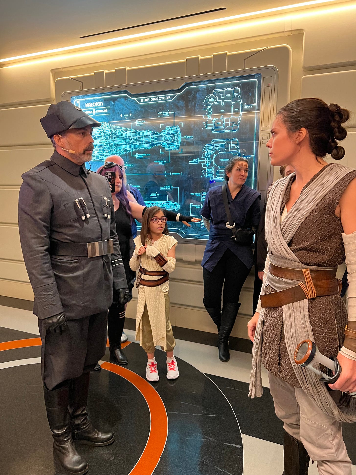 Rey confronting Croy in a corridor