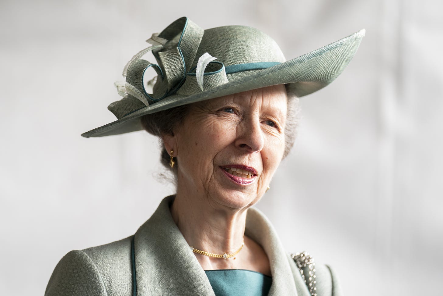 Princess Anne wearing a mint green hat