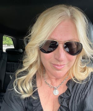 Phoebe Wall Howard took this selfie in her last ride in her Jeep Grand Cherokee en route to the dealership to get a Mach-E.