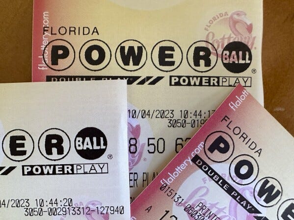 FILE - Powerball lottery tickets are displayed Oct. 4, 2023, in Surfside, Fla. An estimated $1.4 billion Powerball jackpot that has been growing since July is about to be on the line. Saturday night’s jackpot is the world’s fifth-largest lottery prize after rolling over for 33 consecutive drawings. (AP Photo/Wilfredo Lee, File)
