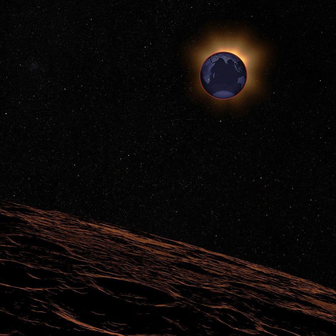 This illustration shows the moon reddened by sunlight filtered through Earth's atmosphere during a total lunar eclipse.