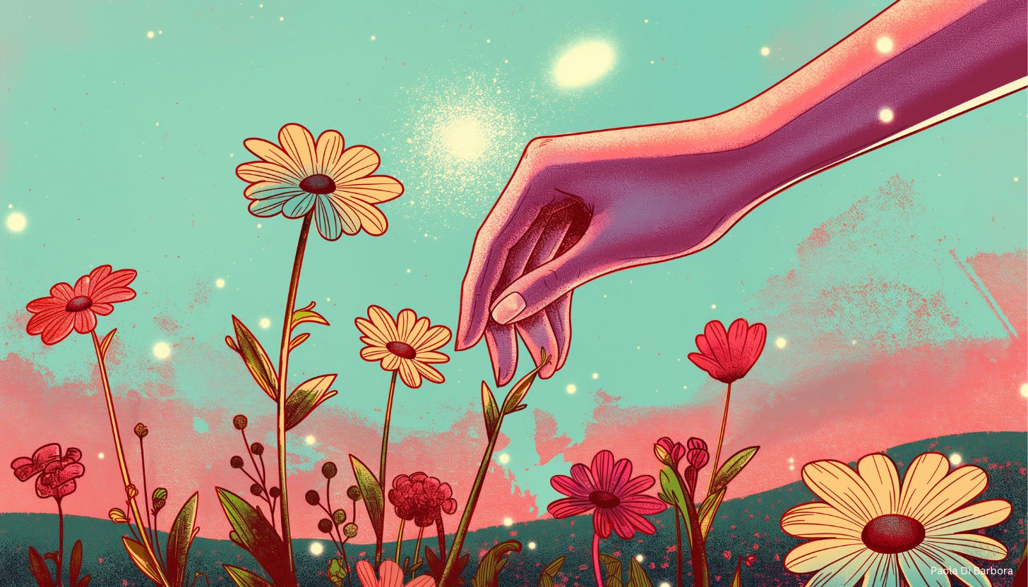 A woman's hand reaching for a daisy from a field of flowers.