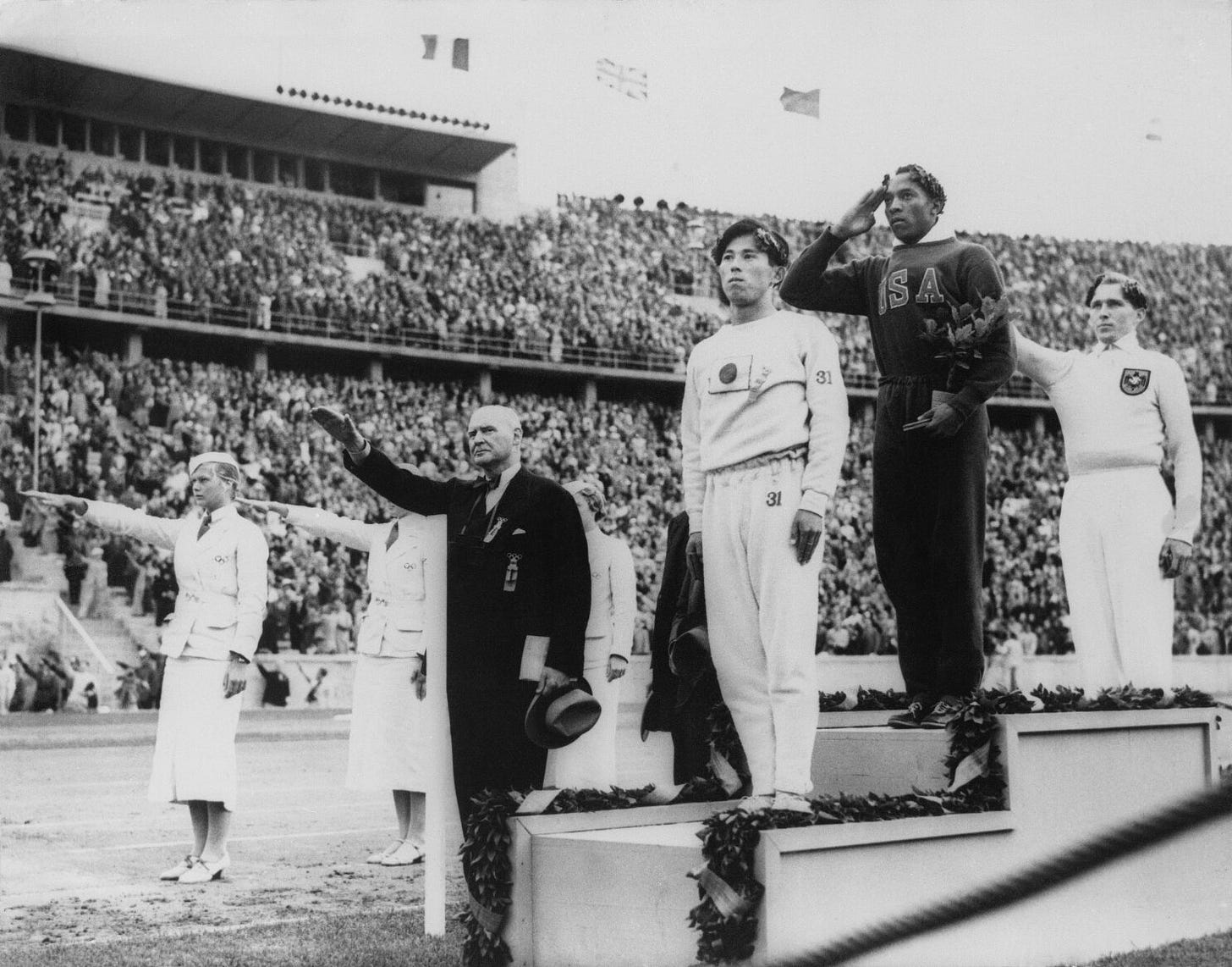 Black Americans star in front of Hitler at Berlin Olympics | AP News