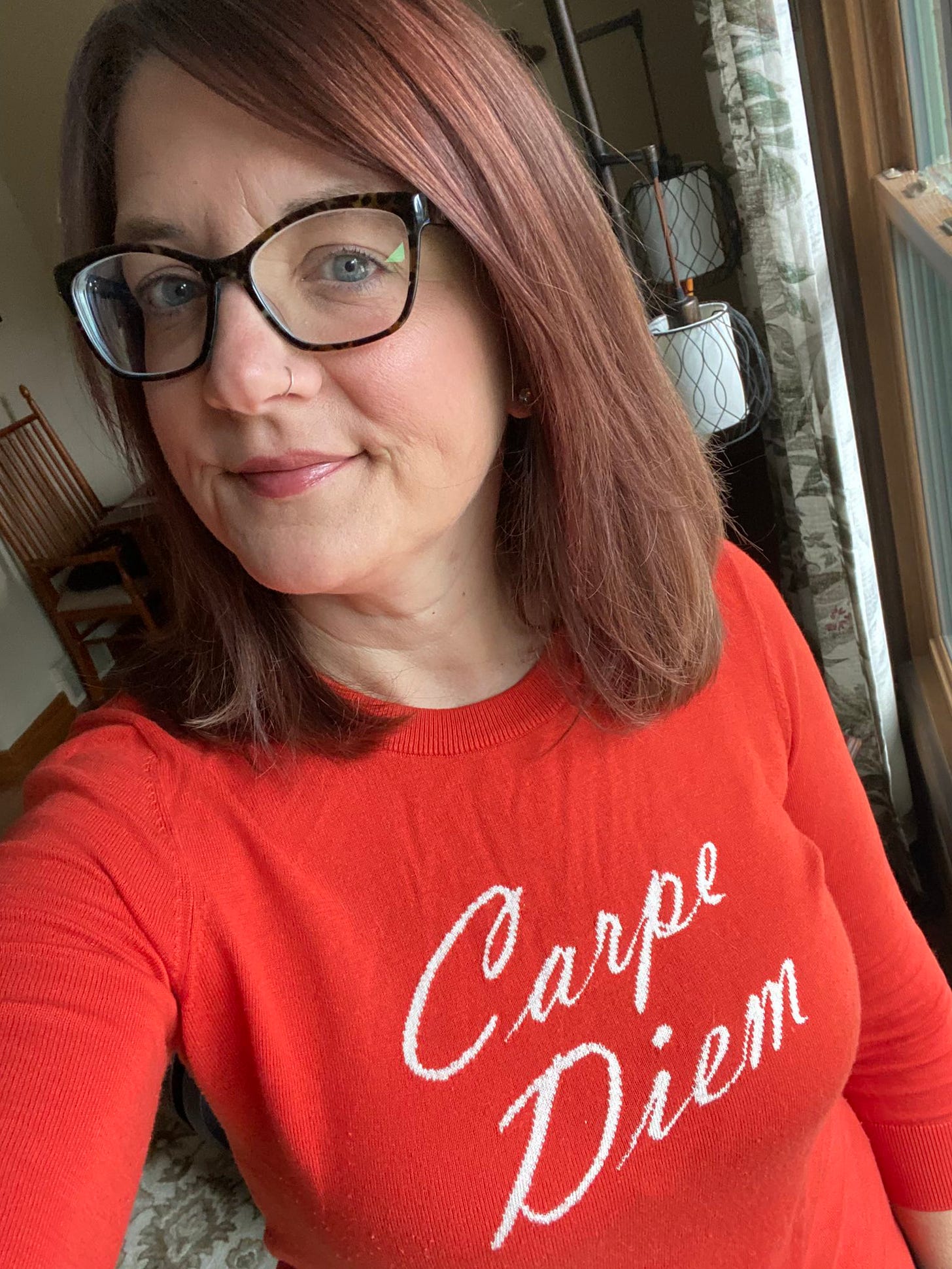 Leslie Flynn wearing a carpe diem shirt