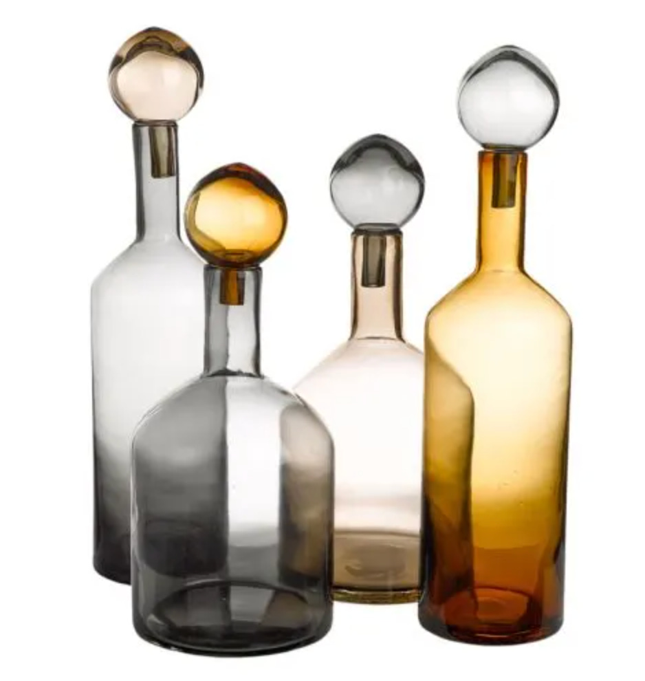 selection of different colour glass bottles