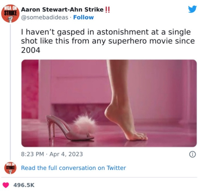 A foot and shoe on a pink floor

Description automatically generated