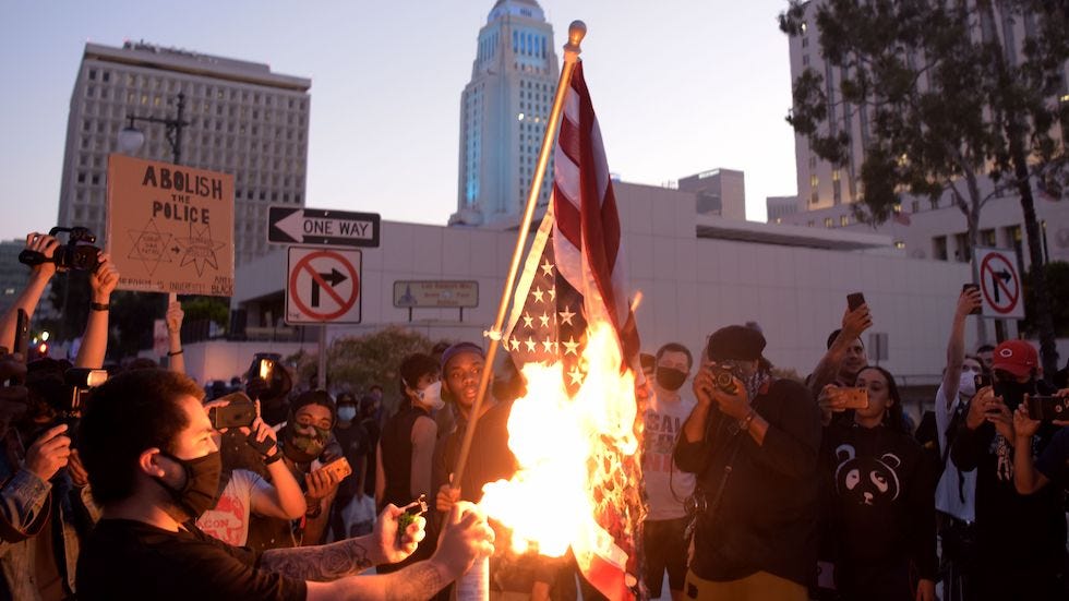Demonstrators burn flag in downtown Los Angeles to protest death of George  Floyd | The Hill