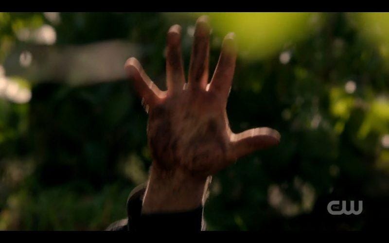 supernatural crowley hand coming up