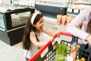 screaming girl in a grocery store