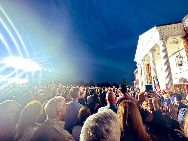 May be an image of 2 people, crowd and Monticello