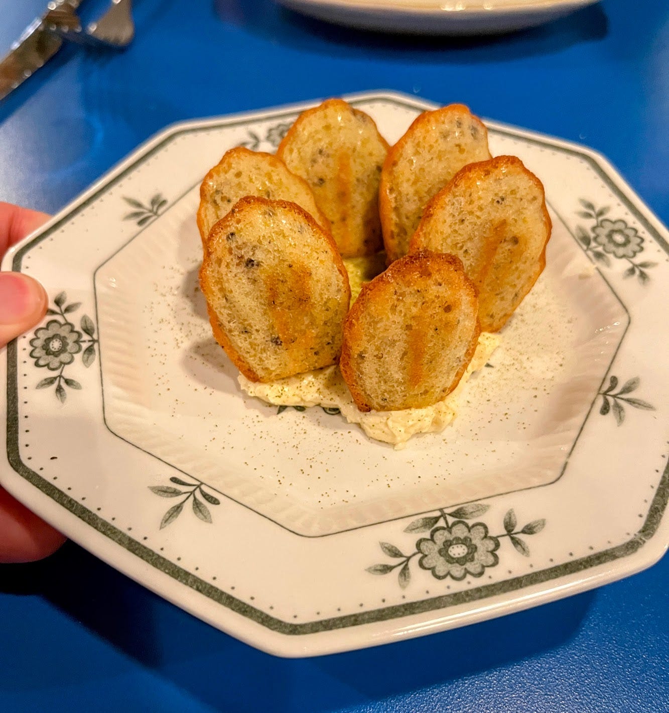 A plate of mini madeleines from the restaurant