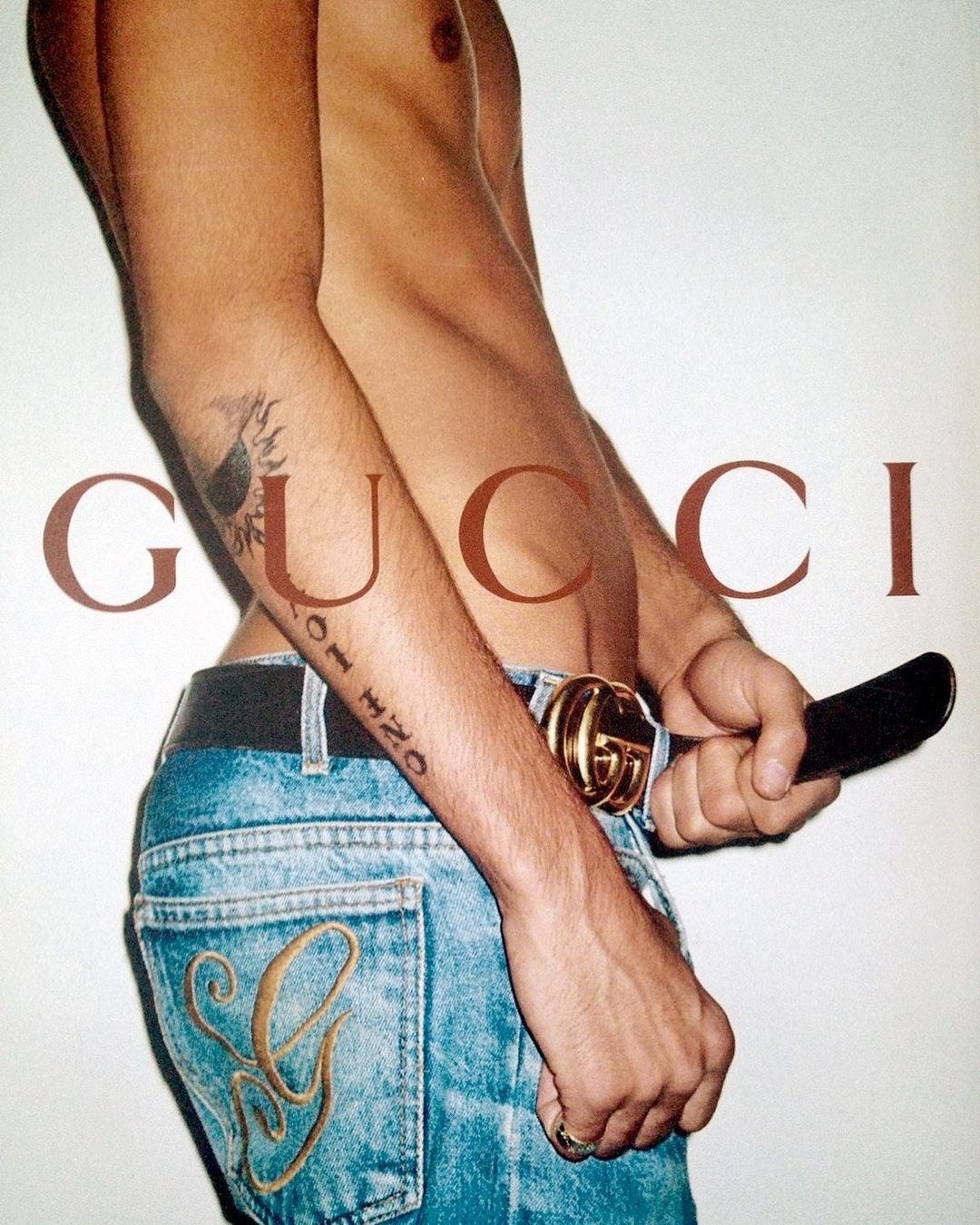 An Instagram  post added by erictrivera on Dec 02, 2023. The author is @html.dad. May present: terry richardson gucci campaign, gucci, joint, hand, shoulder.