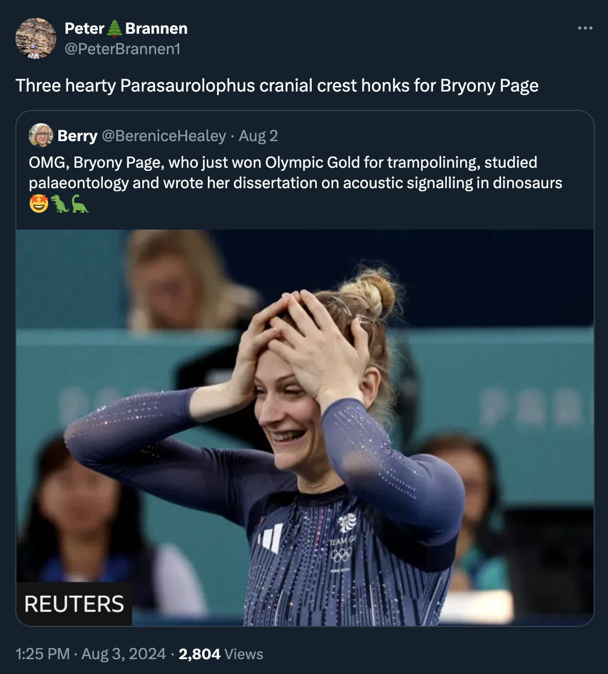 A picture of a white woman with blonde hair holding her head in positive disbelief. Tweet and quote tweet: Three hearty Parasaurolophus cranial crest honks for Bryony Page Quote Berry @BereniceHealey · Aug 2 OMG, Bryony Page, who just won Olympic Gold for trampolining, studied palaeontology and wrote her dissertation on acoustic signalling in dinosaurs 🤩🦖🦕