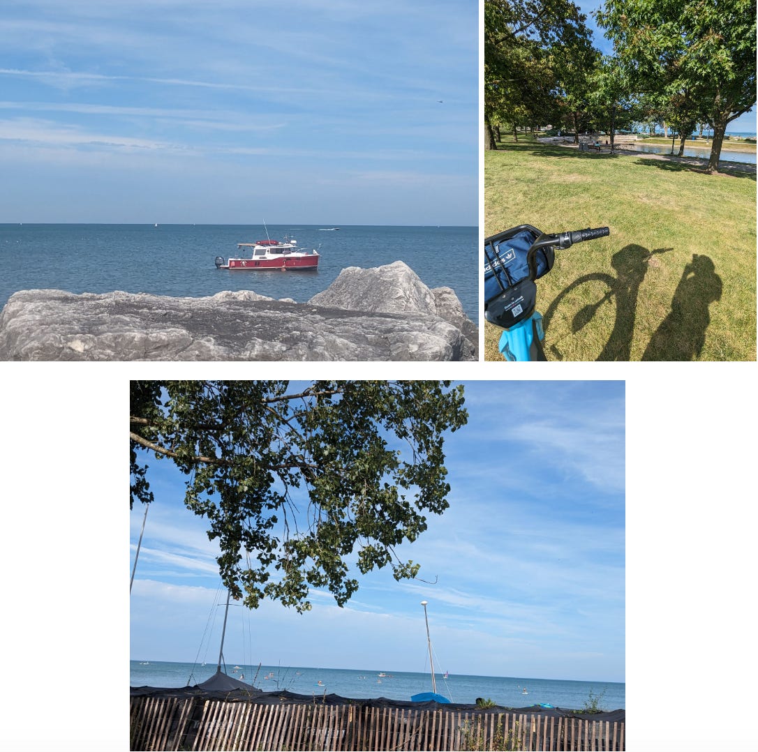 The first photo shows a red and white boat in the middle of the water. There is a person in the water cleaning the side of the boat. The second photo is of Nathalie's shadow next to a bike overlooking a small lagoon filled with ducks. The third photo is of a partition blocking part of the view of people paddle boarding in the water.