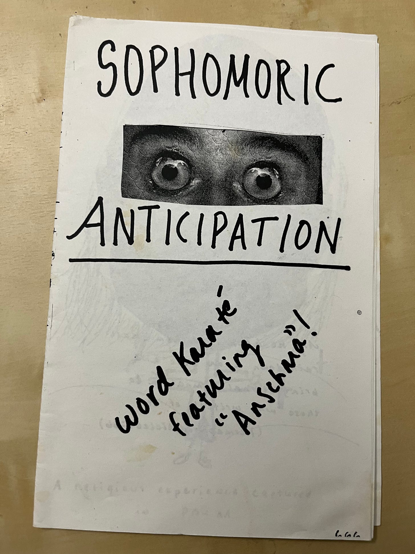 Cover of DIY poetry zine with "SOPHOMORIC ANTICIPATION" written in bold Sharpie with a picture of some big, wide-open eyes, and then "Word Karate featuring "Anschma!"