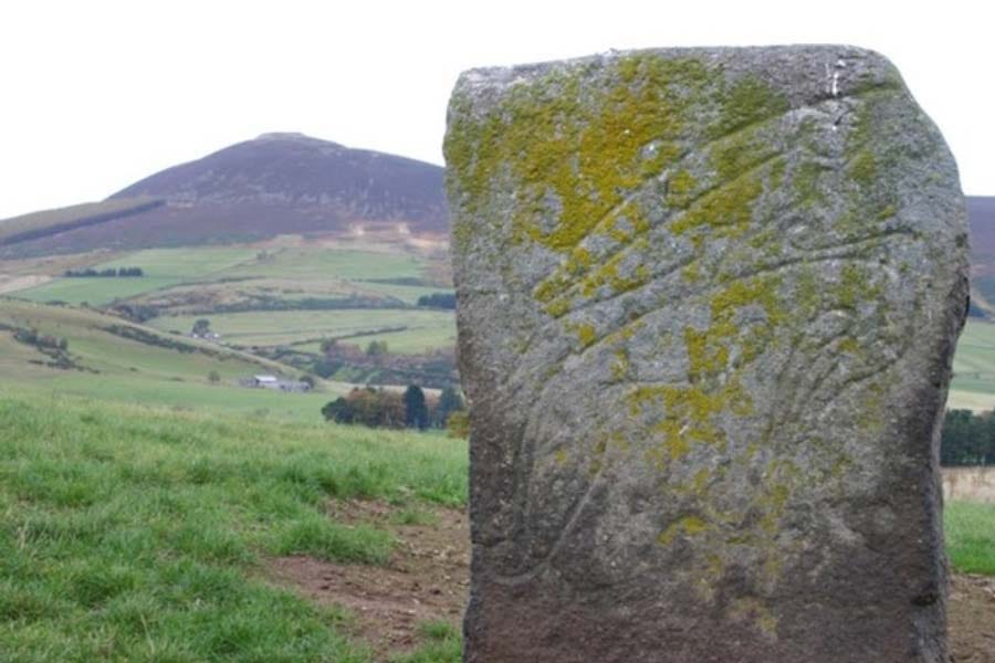 The "Craw Stane", a Pictish symbol stone depicting a salmon and an unknown animal, perhaps the Pictish beastie. (CC BY-SA 2.0)
