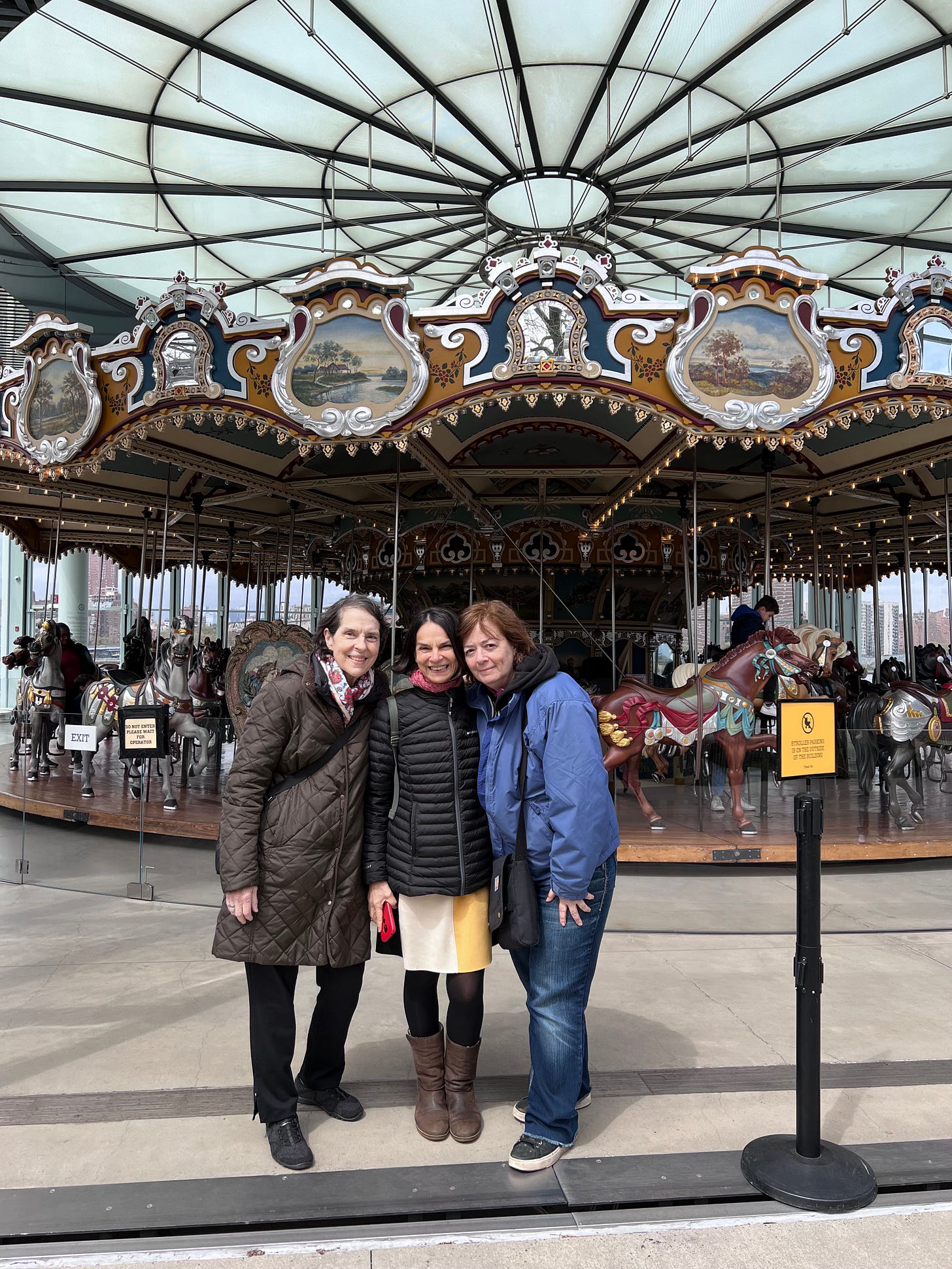 Leila, Sofia, and Sheri in front of Jane's Carousel, Brooklyn Bridge Park