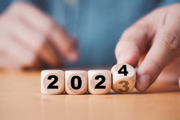 Hand Flipping Of 2023 To 2024 On Wooden Block Cube For Preparation New Year  Change And Start New Business Target Strategy Concept Stock Photo -  Download Image Now - iStock