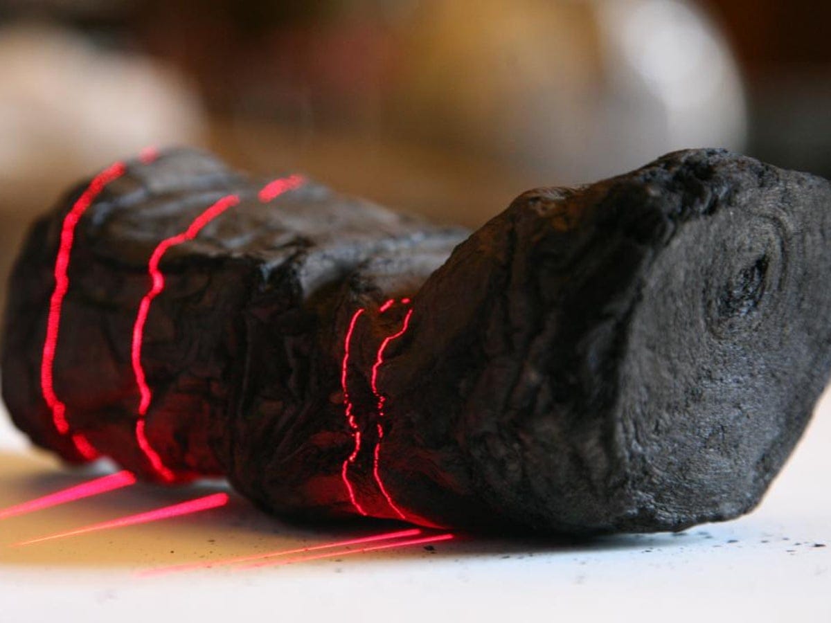 Researchers use AI to read word on ancient scroll burned by Vesuvius |  Science | The Guardian