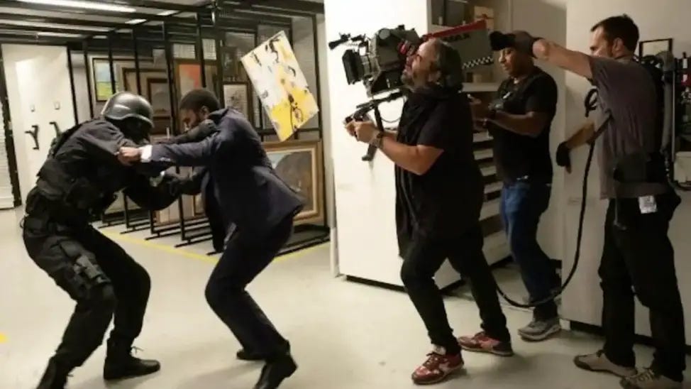 Hoyte van Hoytema holding IMAX camera on his shoulder shooting action scene. Picture: Warner Bros. Pictures