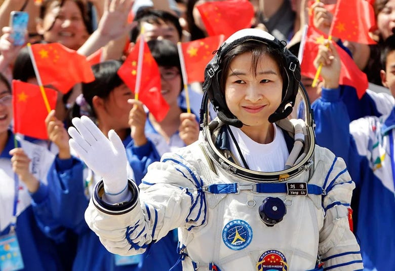 Liu Yang on her way to the launch pad for the Shenzhou 9 mission.