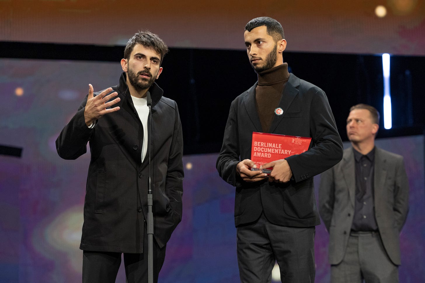 Yuval Abraham and Basel Adra winning for ‘No Other Land’ berlinale
