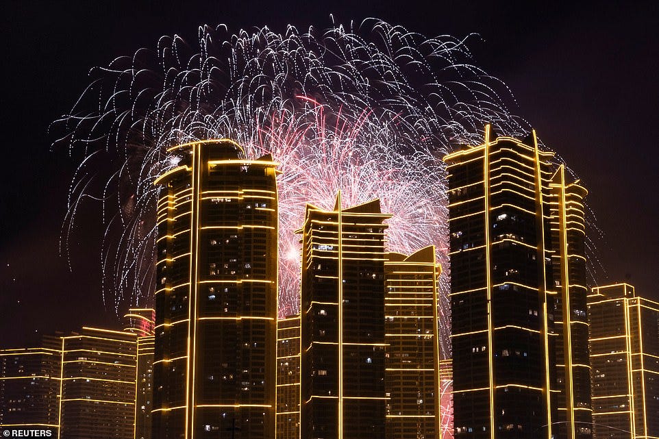 PHILIPPINES: Fireworks explode over Rockwell Center in celebration of the New Year in Mandaluyong City, Metro Manila, Philippines, January 1, 2025