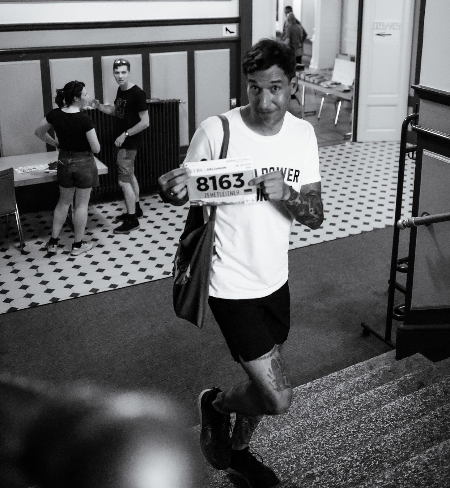 The author showing a bib number