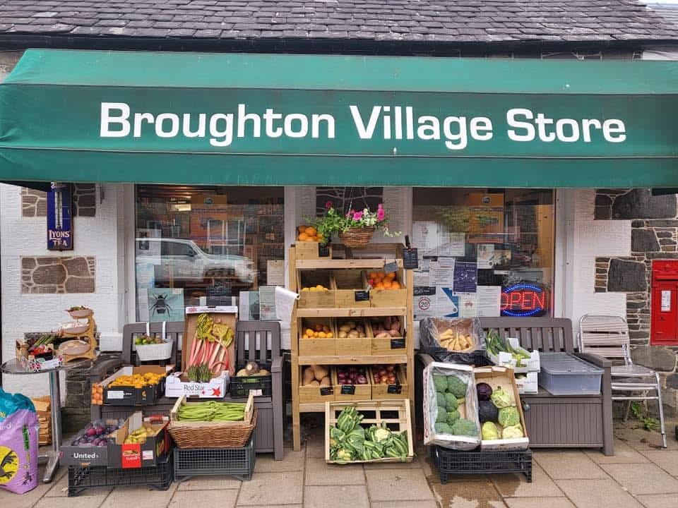 May be an image of text that says "YONS TFA Broughton Village Store OPEN RedStar United"
