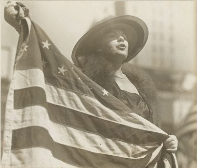 165-WW-240C-5: Liberty Bonds - Personnel: C - LIBERTY LOAN DRIVE OPENS WITH A RUSH. In less than three hours, New York subscribed $100,000,000 to the $6,000,000,000 Liberty Loan Drive. Mrs. Alma Clayburgh opening the Stage Women's War Relief Booth at New York Public Library with singing the Star Spangled Banner