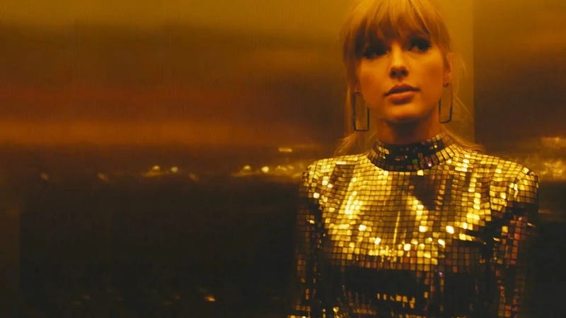 Taylor Swift in a disco ball dress in Miss Americana.