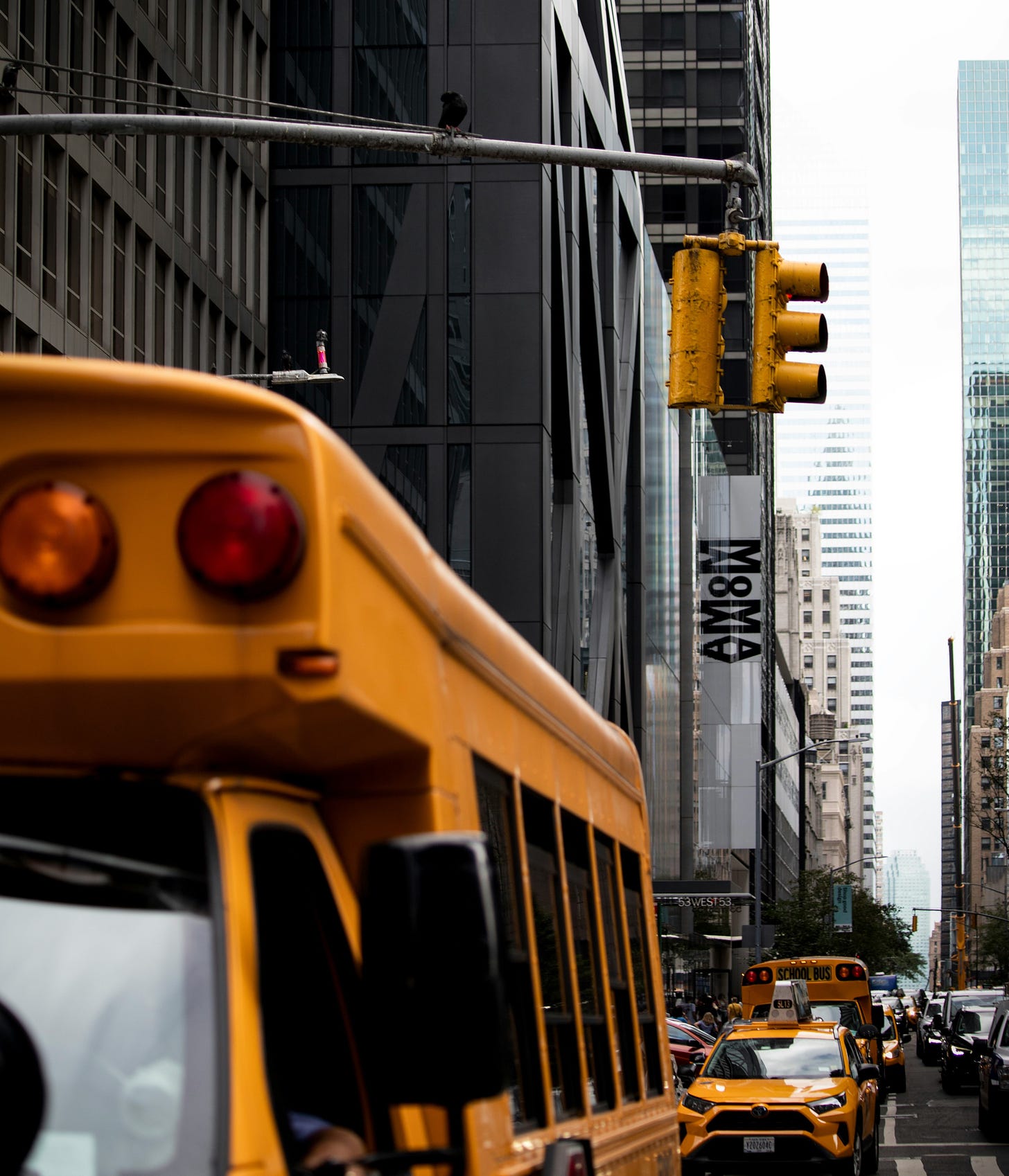 busy New York street, traffic and buildings