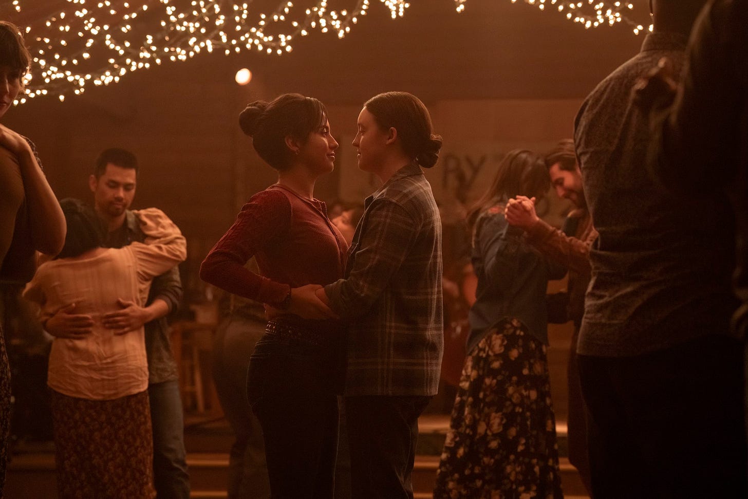 Isabela Merced as Dina and Bella Ramsey as Ellie in The Last of Us Season 2, Episode 1, “Future Days.” Isabela Merced as Dina and Bella Ramsey as Ellie in The Last of Us Season 2, Episode 1, “Future Days.”
