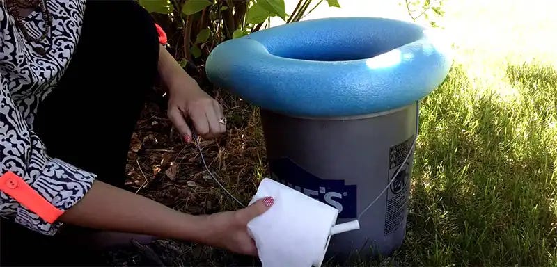 Photo of a 5-gallon bucket toilet