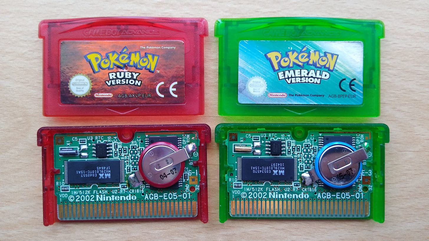 Legitimate copies of Pokémon Ruby and Emerald (Photo credit: Johto Times)